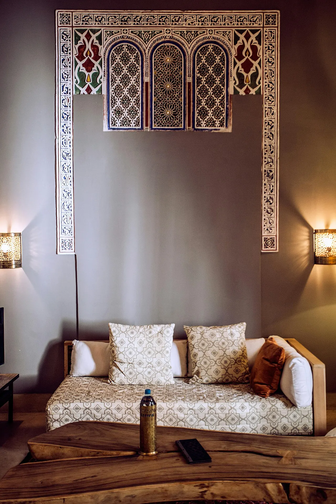 Boutique suite with earthy textiles and sunset light for premium worldwide travel
