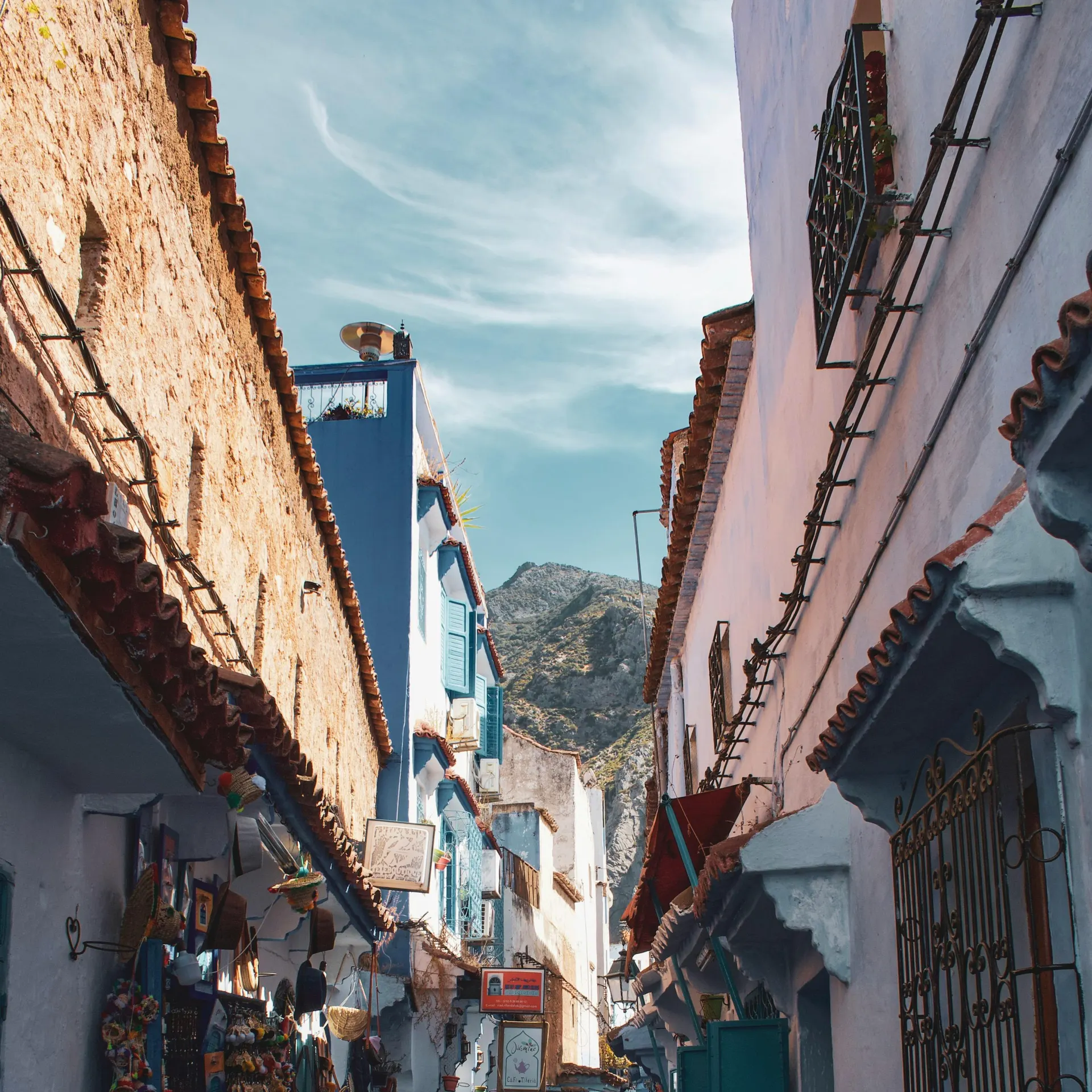 Warm old city lane with lantern glow and boutique hotel atmosphere