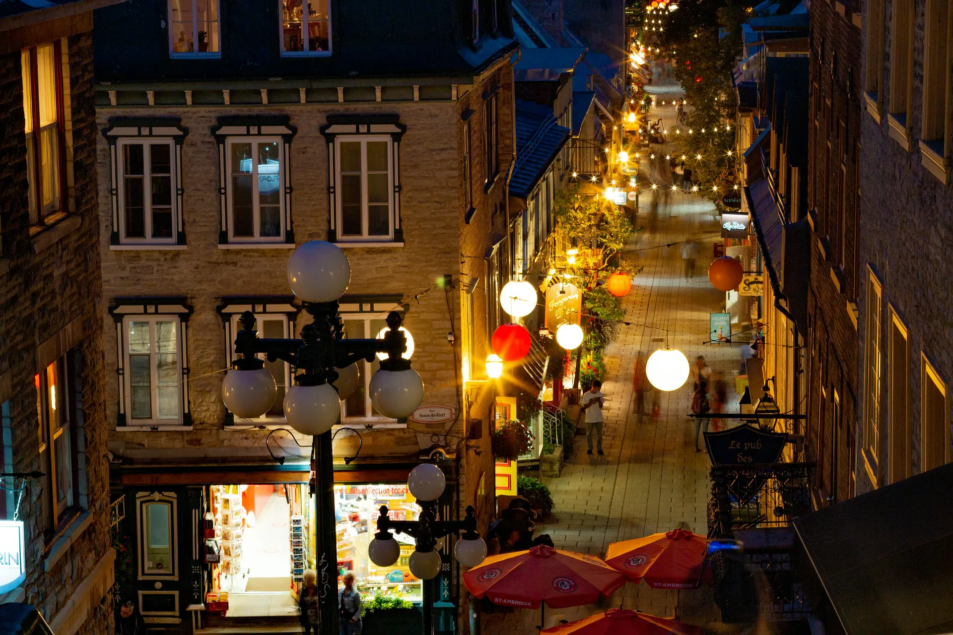Historic street with warm stone facades, market textures and editorial travel atmosphere